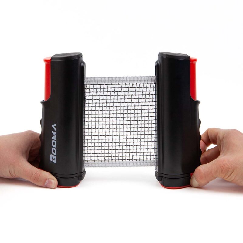 Image of 2 hands stretching BOOMA's retractable ping pong net.