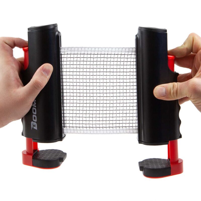 Image of 2 hands holding BOOMA's retractable ping pong net to adjust the height.