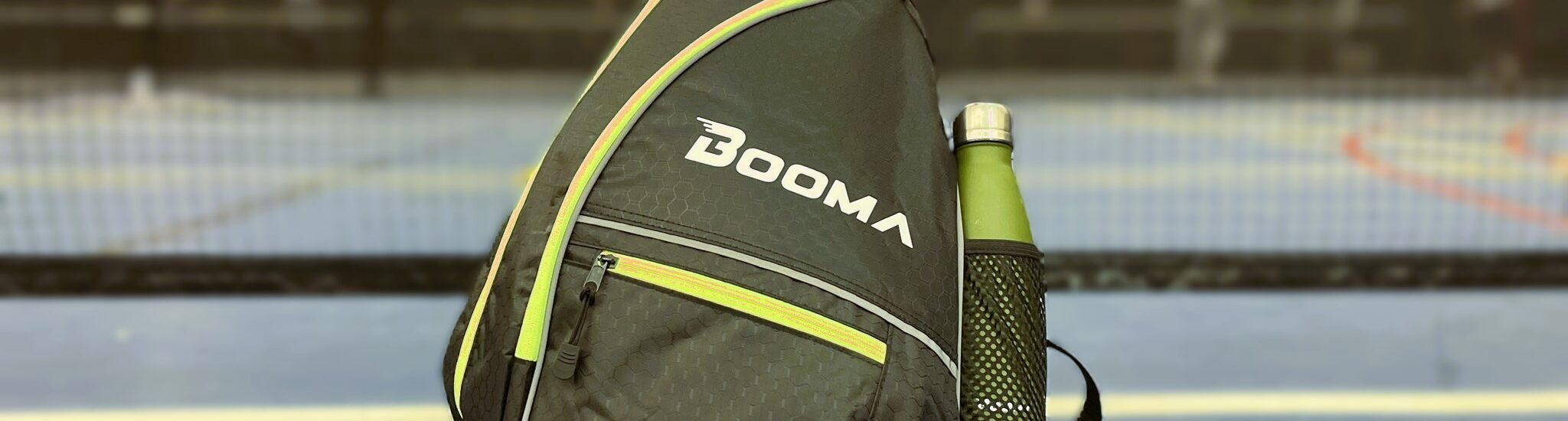 BOOMA pickleball bag at the net.